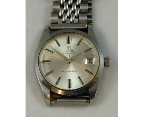 Tudor - an Oyster Date stainless steel manual wind wristwatch, circa 1965, the silvered dial with baton markings and date ape