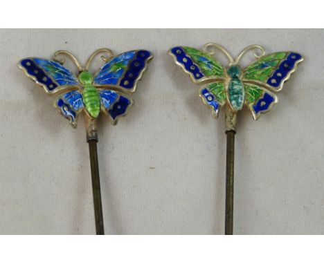 Charles Horner, Chester - an Edwardian silver and enamel pair of hat pins, 1908, in the form of articulated butterflies (2).