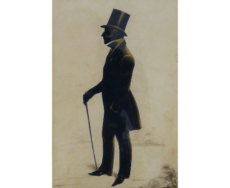 Frederick Frith (1819-1871) A silhouette portrait of a gentleman looking to dexter, black ink heightened with gold and white,