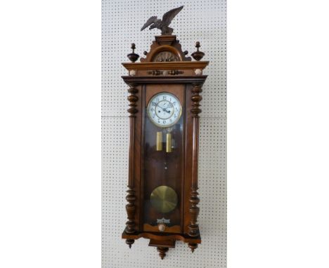 Gustav Becker, a Victorian walnut two weight Vienna style regulator, the white enamel two part dial with black Roman numerals