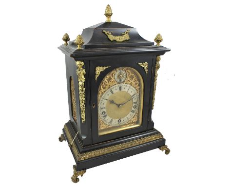 Winterhalder and Hofmeier, a Victorian ebonised and brass repeating bracket clock, the brass dial with silvered chapter ring 