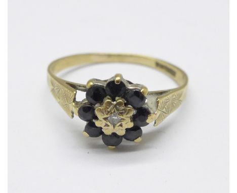 A 9ct gold, sapphire and diamond ring, 1.6g, N 