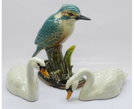 Two Beswick swans and a model of a kingfisher 