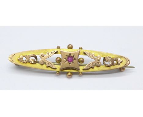 A 9ct gold ruby set brooch, 2.2g 