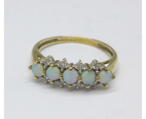 A 9ct gold, opal and diamond ring, 2g, N 