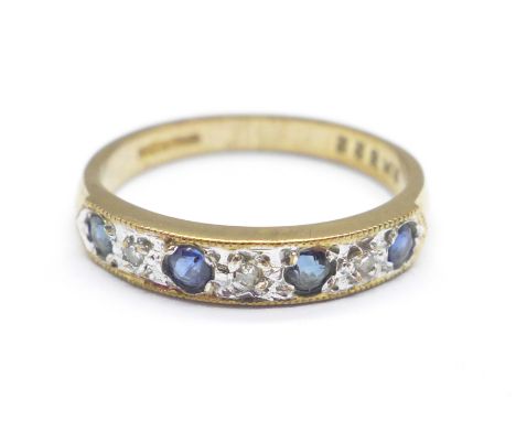 A 9ct gold, sapphire and diamond, seven stone ring, 2.2g, N 