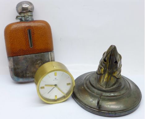 A Cyma Watch Co. travel clock, a hip flask and a key hook in the form of a dog's head 