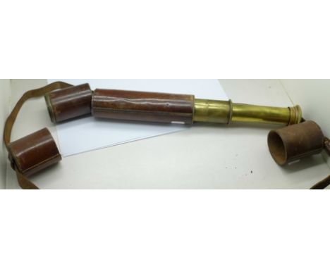 A WWI period brass and leather telescope 