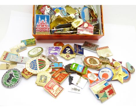A collection of Russian metal and enamel badges 