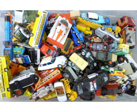 A box of mixed Matchbox and other die-cast model vehicles 