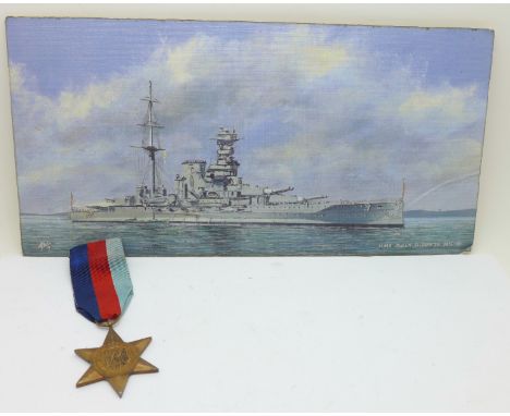 A WWII medal, The 1939-45 Star and a print of HMS Queen Elizabeth 