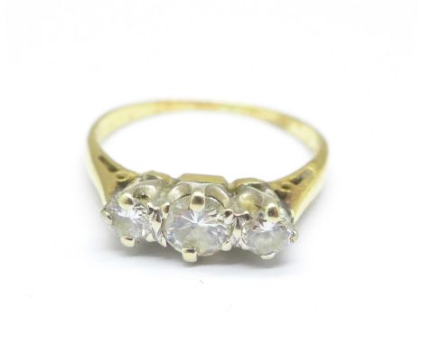 A yellow metal set, three stone diamond ring, 2.2g, L 