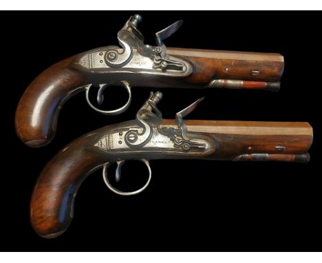 Clarke of Dublin A Pair of Irish 10-Bore Flintlock Travelling Pistols by Clarke, Dublin c1800. Octagonal 5-3/4" Damascus twis