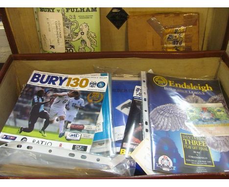 A collection of football memorabilia, mainly relating to Bury Football Club, to include football programs from the 1940s to 2