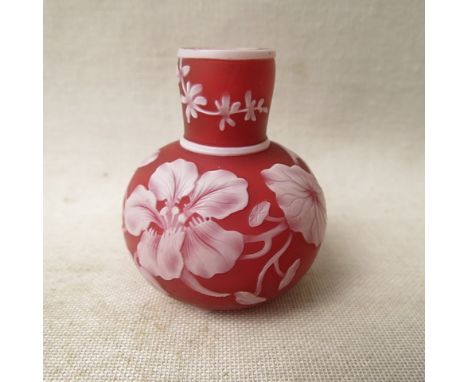 A miniature Stourbridge cameo glass vase, clear glass over red, over opal with floral decoration, probably Thomas Webb, 19th 