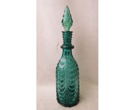 A Georgian green glass decanter, circa 1935 decorated with mechanically cut drapes, fluted cut shoulders and star cut base, w