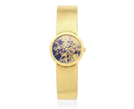 Patek Phillipe. A lady's 18K gold manual wind bracelet watchModel: CalatravaReference: 4114/1Date: Sold 21st January 1974Move