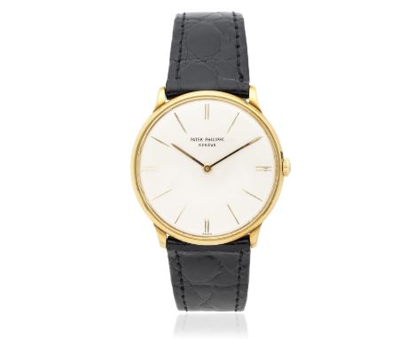 Patek Philippe. An 18K gold manual wind wristwatchModel: CalatravaReference: 2573/1Date: Sold 15th September 1960Movement: 18