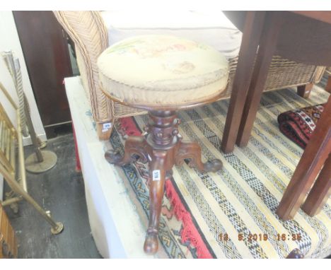 A revolving piano stool