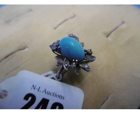 A vintage turquoise and diamond  dress ring unmarked white metal