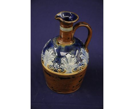 Doulton Lambeth Stoneware loop handled jug, the base with impressed marks and No 5423 entitled 'Scotch' (23cm high)