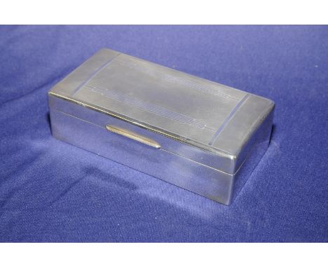 Asprey & Co London 1928 silver hallmarked rectangular cigarette table box with engine turned Art Deco detail to the top and g