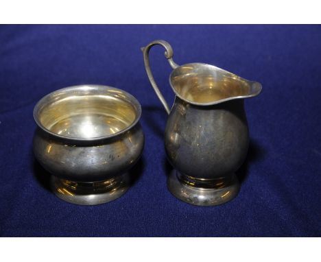 Birmingham silver hallmarked milk jug and sugar basin with makers mark A.T.C, jug 10cm high