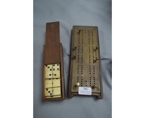 Brass Cribbage Board and a Set of Dominoes 
