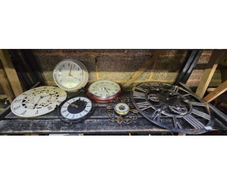 SHELF WITH A COLLECTION OF WALL CLOCKS & A SMALL ANEROID BAROMETER