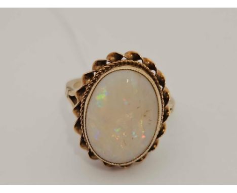 9ct  GOOD COLOUR LARGE OPAL RING, 3.9g