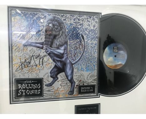 A framed &amp; glazed signed LP cover of the Rolling Stones signed by Mick Jagger, Ron Wood, Keith Richards &amp; Charlie Wat