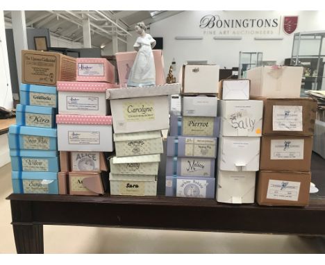 A large quantity of boxed dolls to inc Kish &amp; Company examples; together with a boxed Nao figure