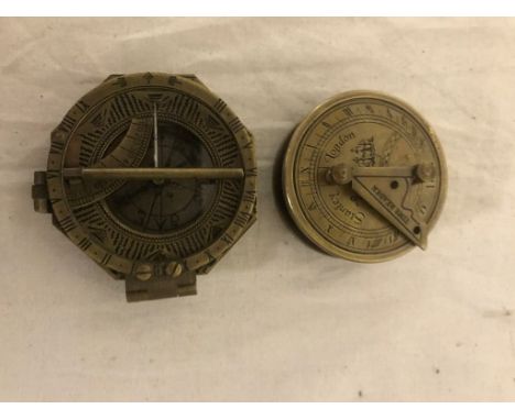 Two bronze  compasses