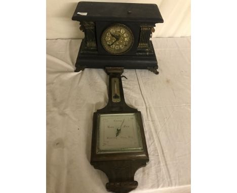 An oak barometer; together with a mantel clock