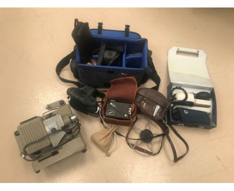 A quantity of cameras, projector etc