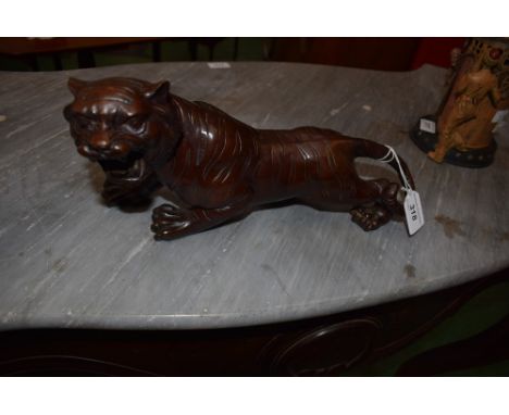 A bronzed model of a  tiger