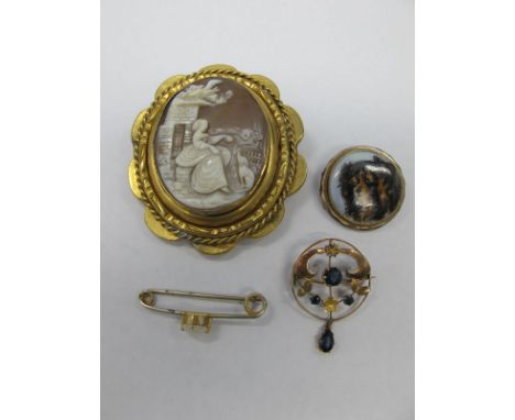 A XIX Century Oval Shell Carved Cameo Brooch, depicting seated female with dog beside a building, a circular ceramic panel br