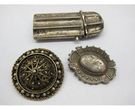 A Decorative Vesta Case, of shaped design with engraved decoration, the hinged lid with push button close; An Israeli Brooch,