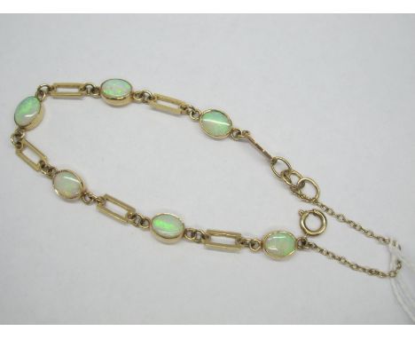 A Modern 9ct Gold Opal Set Bracelet, composed of six oval cabochon opals, collet set between rectangular openwork links.
