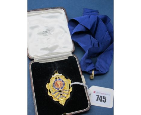A 9ct Gold Medallion Pendant, highlighted in enamel, "Past President National Federation of Plumbers & Domestic Engineers Emp