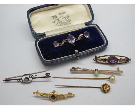 A Single Stone Opal Set Bar Brooch, oval collet set; together with other assorted bar brooches (damages).