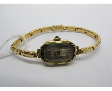 An 18ct Gold Cased Ladies Wristwatch, the rectangular dial with black Arabic numerals, within case highlighted in green and b