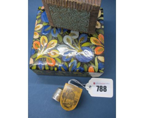 A Mauchline Thimble Case, "Laxley Wheel", containing a hallmarked silver thimble; together with two square trinket boxes.
