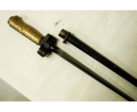 A French M1886 pattern Lebel Bayonet, 51cm cruciform section blade push button release, brass plain grip, tapering circular s