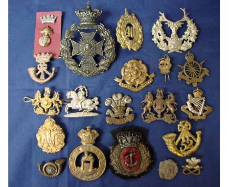 A mixed collection of 14 hat and 4 collar badges incl; 52nd of Foot Glengarry,  8th Hussars, Irish Fusiliers, The Welch. York