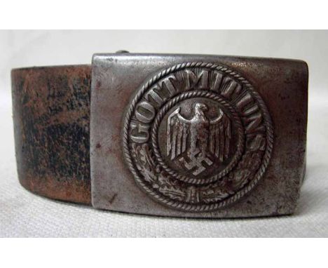 A WW2 German Army Nazi leather belt with pressed steel buckle embossed with Eagle and Swastika emblem, worded Gott Mit uns 