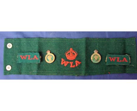 WW2 Women's Land Army group consisting of Green armband, shoulder slides and hat badges