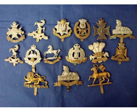 Fifteen British Army County Regiment cap badges. Notts & Derby and King's missing rear fastenings