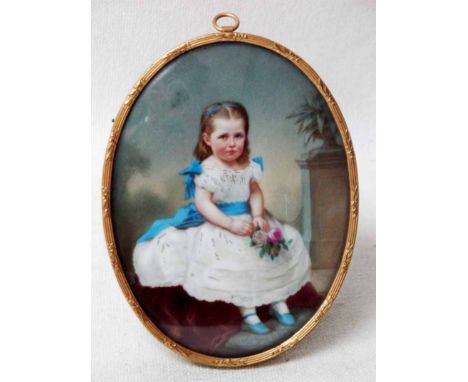 An early 20th century hand painted Portrait Miniature depicting a young girl, seated in a lace dress, blue accessories holdin