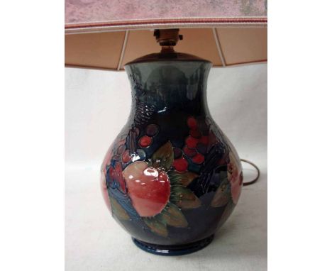 A William Moorcroft late 20th century pottery Table Lamp of baluster form, tubeline decorated in the Finches design on gradua